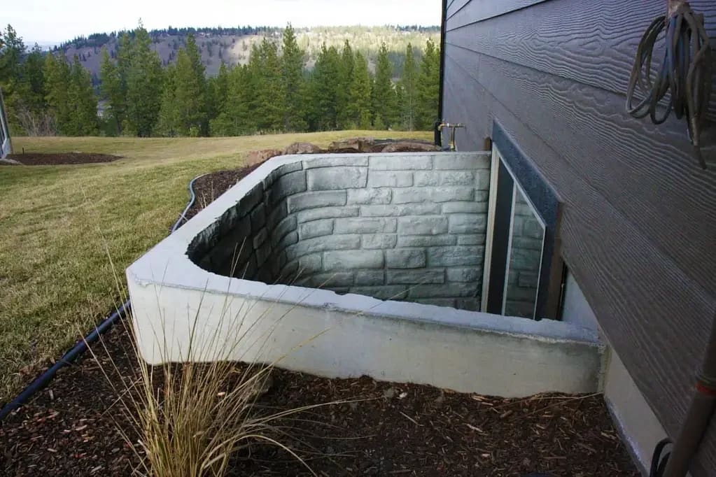 4 Alberta code numbers that make a Calgary basement window well egress-legal 1 precast window well