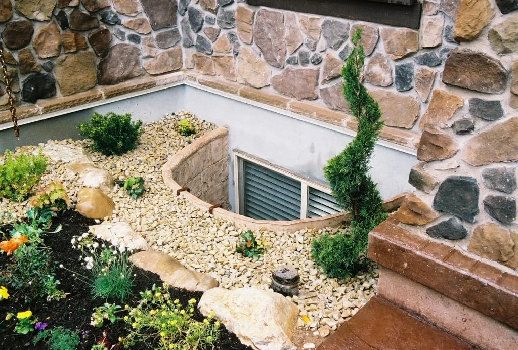 Why basement window wells flood in Calgary, and how a precast well drains 2 window well